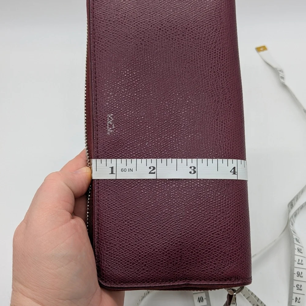 Tumi Plum Purple Leather Wallet